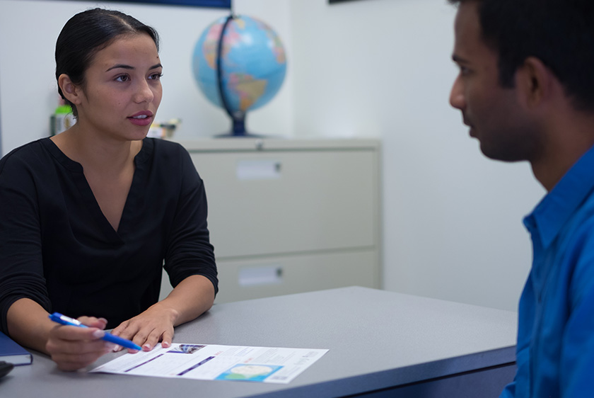 A counselor talking to a student