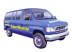 Super Shuttle blue van.