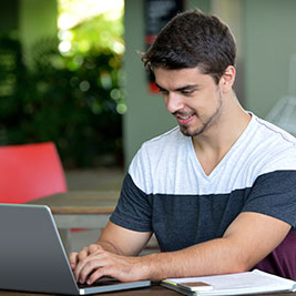 student studying on laptop