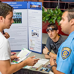 Students speaking about campus safety with University Police