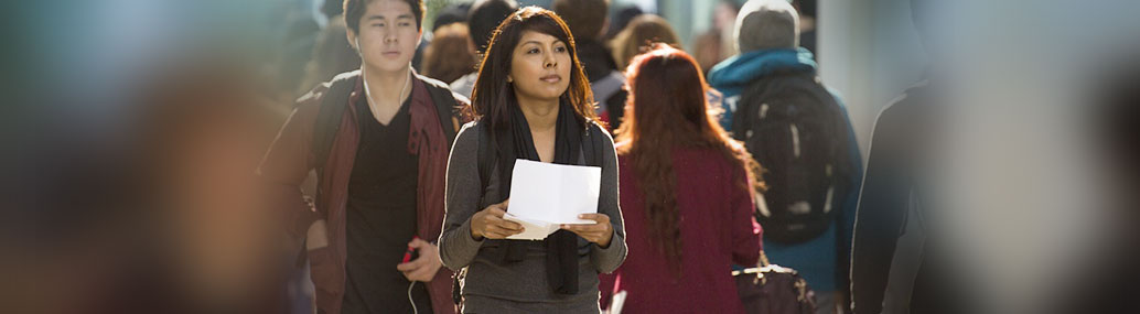 A student walking on campus