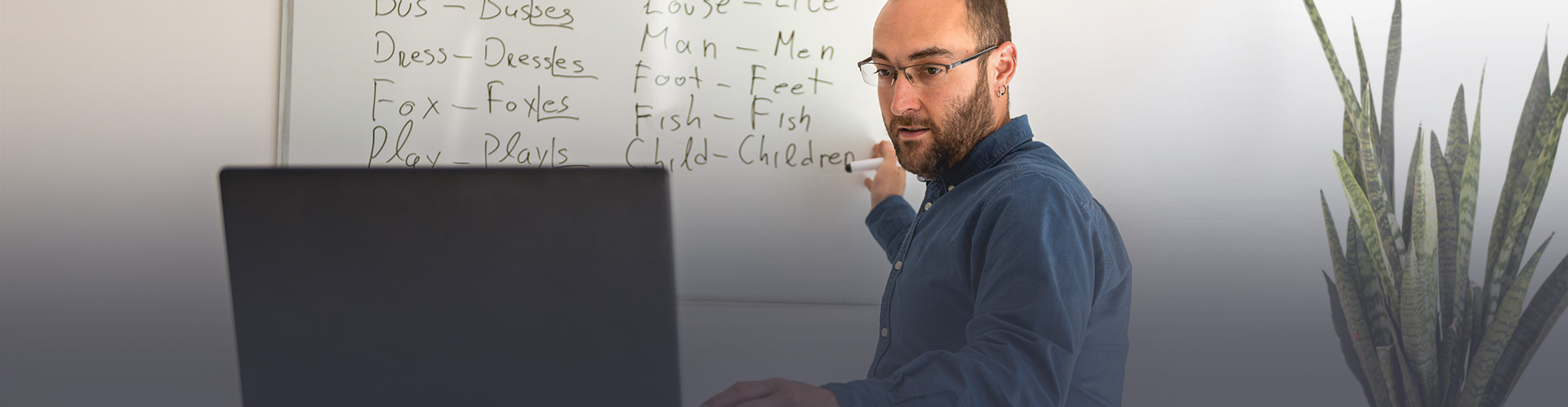 Instructor working on computer