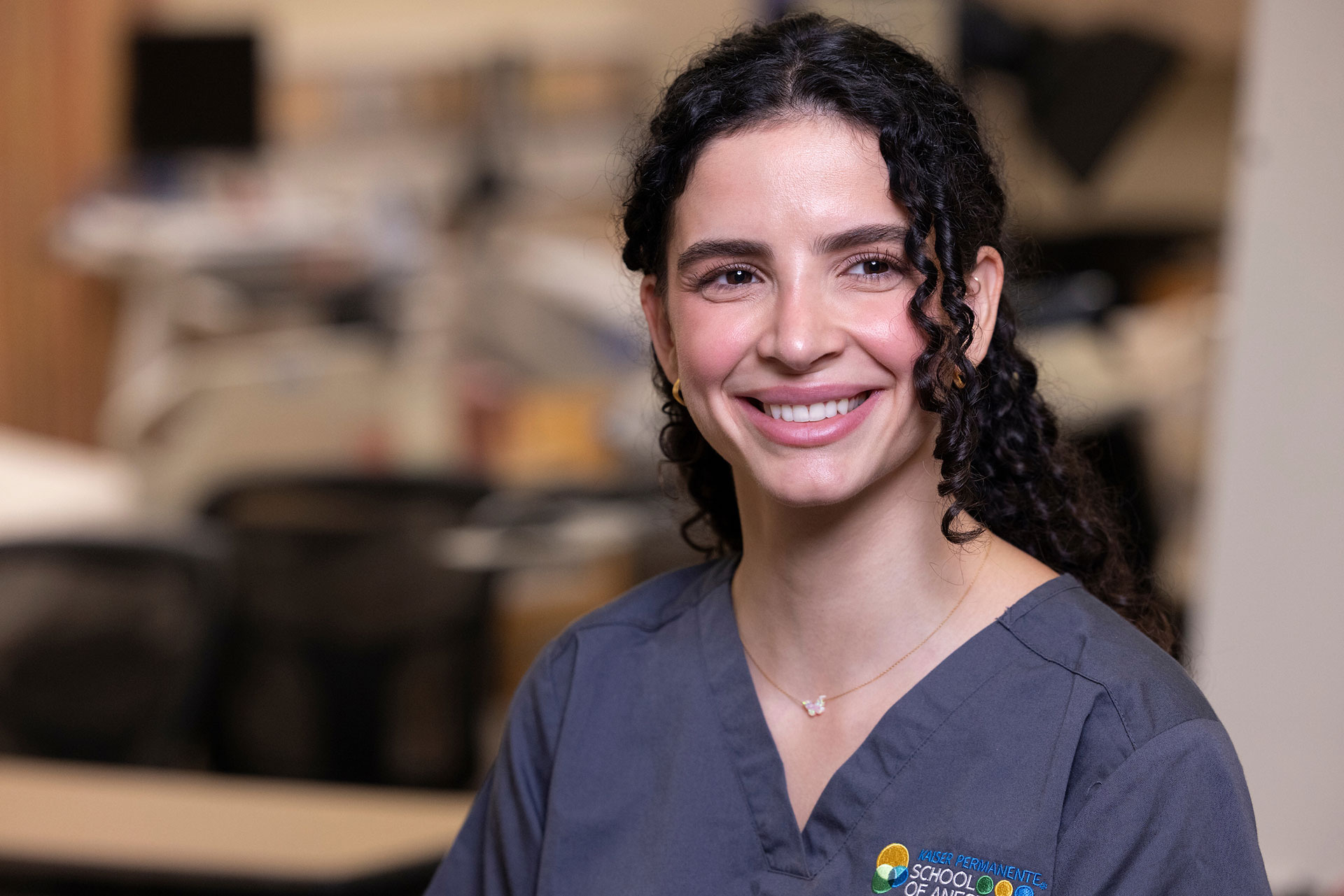 A female student with scrubs.