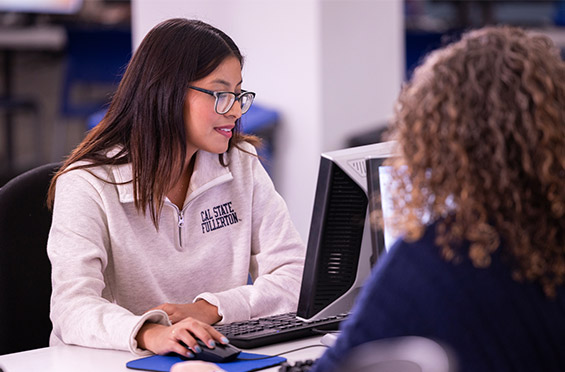 a counseler meeting with a student