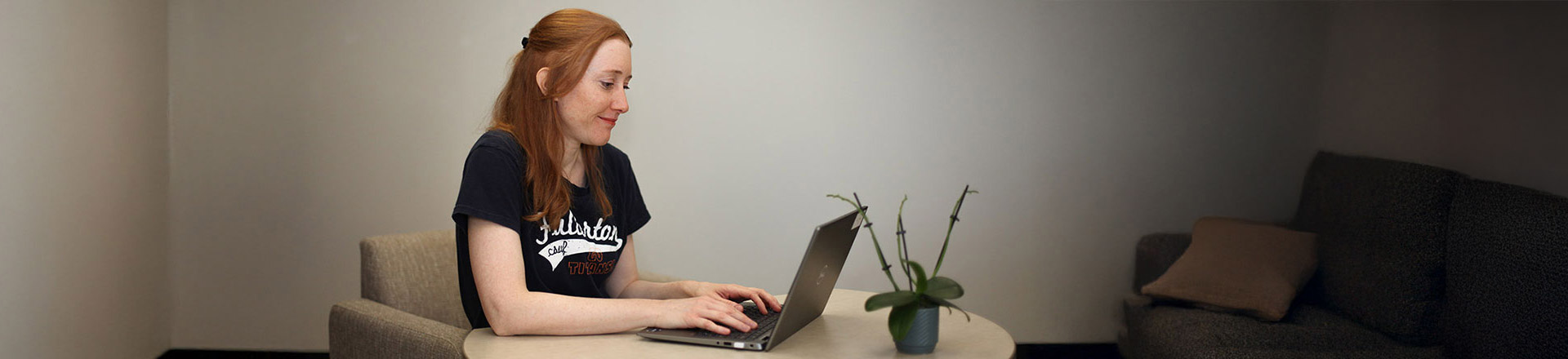 Woman taking an online class on a laptop