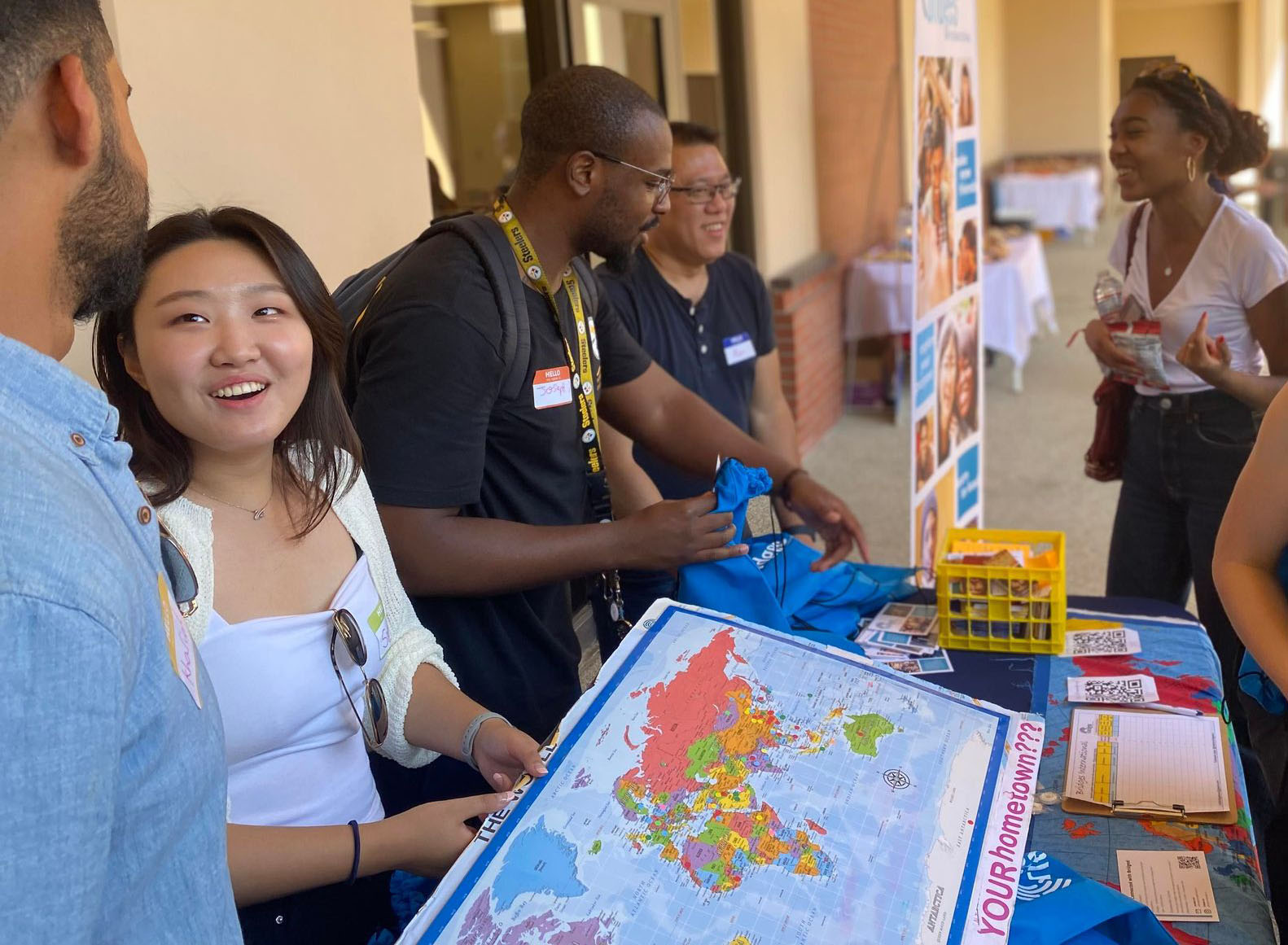 Group of students and Study Abroad alums talking to each other