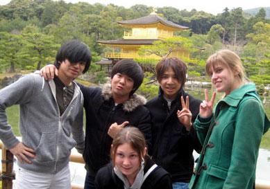 Student, Mark, with other students in front of scenic view of building in Tokyo