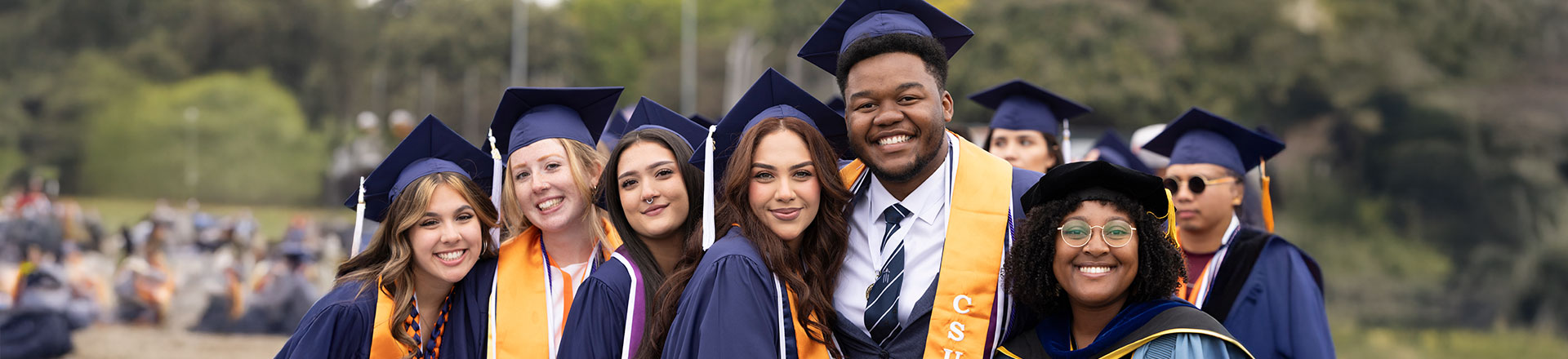 Group of graduate students in graduation gowns